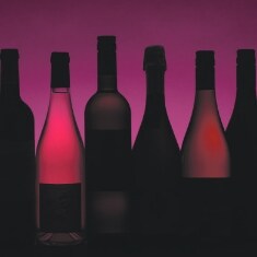 Mystery bottles of wine in a row